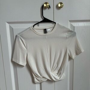White Divided T-shirt. Size S.